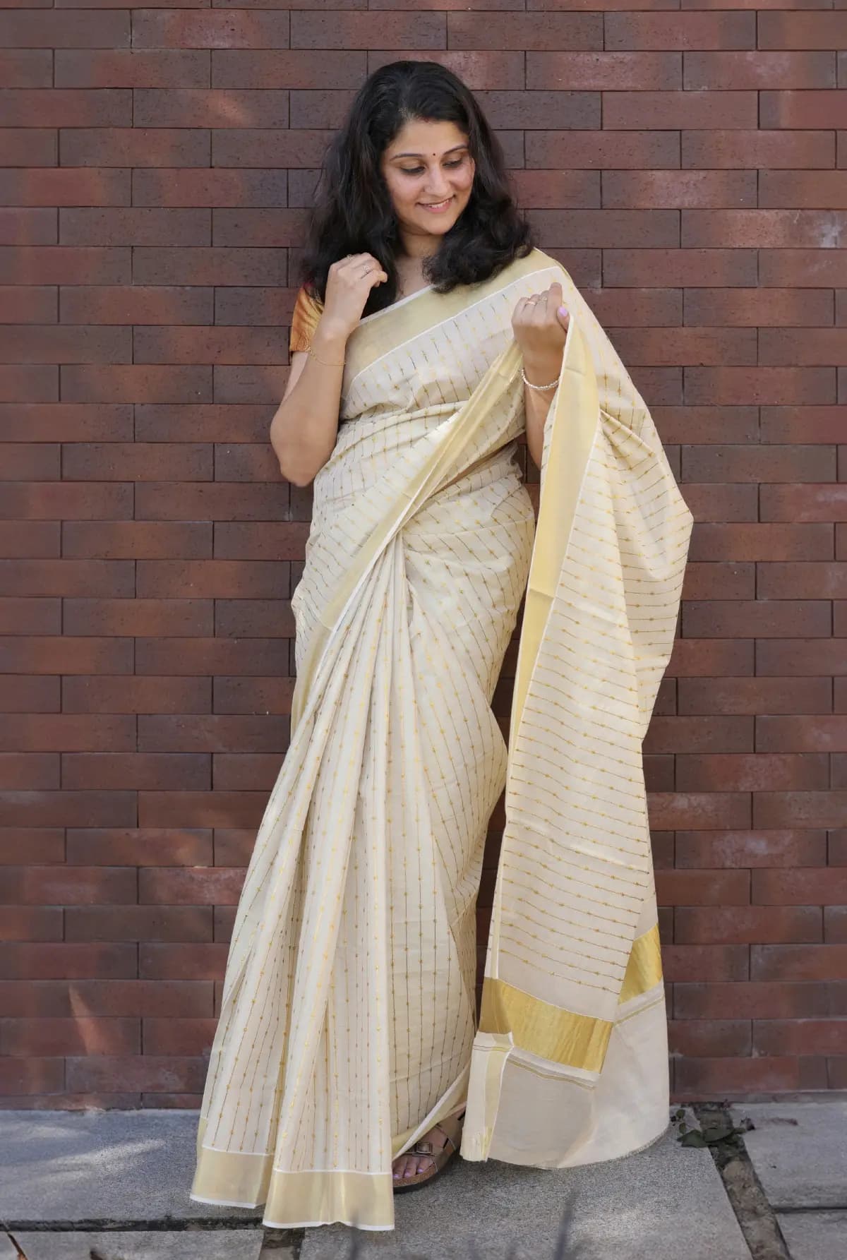 Onam special saree in Tissue   - Off-white
